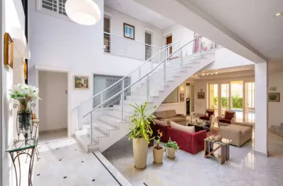 Casa à venda em condomínio com 5 quartos e 5 suítes e 7 vagas de garagem