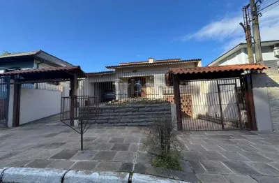 Casa em condomínio fechado com 4 quartos à venda na rua gomes freire de andrade, 430, nossa senhora das graças, canoas por r$ 1.430.000