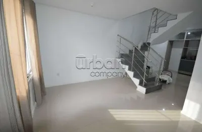 Casa em condomínio fechado com 3 quartos à venda na rua imbe, 681, estância velha, canoas por r$ 470.000