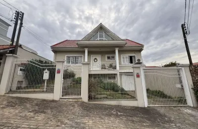 Casa em condomínio fechado com 3 quartos à venda na rua das petúnias, 72, nossa senhora das graças, canoas por r$ 1.400.000