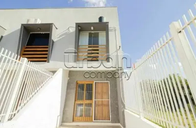 Casa em condomínio fechado com 2 quartos à venda na rua gildo de freitas, 641, olaria, canoas por r$ 270.000