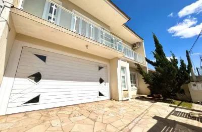 Casa em condomínio fechado com 4 quartos à venda na rua andrômeda, 319, estância velha, canoas por r$ 1.300.000