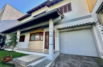 Casa em condomínio fechado com 5 quartos à venda na petunias, 144, loteamento bela vista, canoas por r$ 1.070.000