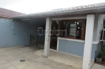 Casa em condomínio fechado com 3 quartos à venda na rua turim, 236, são josé, canoas por r$ 450.000