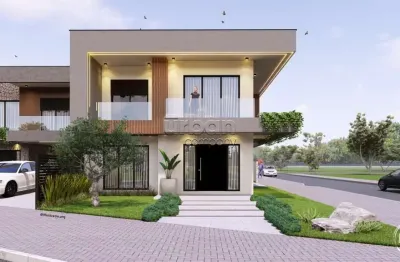 Casa em condomínio fechado com 3 quartos à venda na rua doutor alfredo angelo filho, 204, igara, canoas por r$ 1.450.000