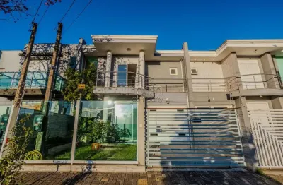 Casa em condomínio fechado com 3 quartos à venda na rua luis alberto ribeiro de castro, 83, mont serrat, canoas por r$ 939.000