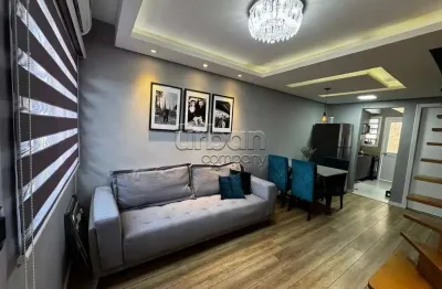 Casa em condomínio fechado com 2 quartos à venda na avenida guilherme schell, 1250, rio branco, canoas por r$ 244.900