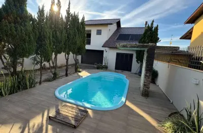 Casa em condomínio fechado com 3 quartos à venda na rua paraná, 152, parque amador, esteio por r$ 1.399.999