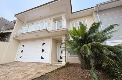 Casa em condomínio fechado com 4 quartos à venda na rua taurus, 277, estância velha, canoas por r$ 1.400.000
