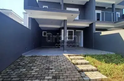 Casa em condomínio fechado com 3 quartos à venda na rua venezuela, 369, são josé, canoas por r$ 799.000