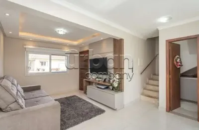 Casa em condomínio fechado com 3 quartos à venda na rua república, 2708, harmonia, canoas por r$ 429.000