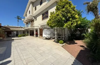 Casa em condomínio fechado com 5 quartos à venda na rua das camélias, 571, igara, canoas por r$ 1.279.990