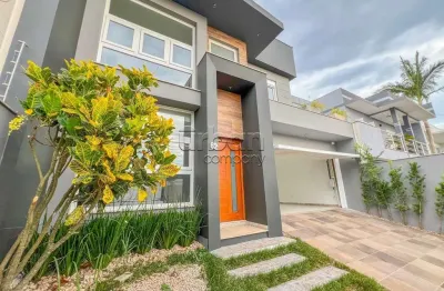 Casa em condomínio fechado com 3 quartos à venda na rua doutor iran maciel, 62, estância velha, canoas por r$ 1.299.799
