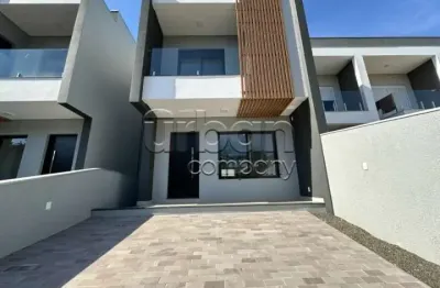 Casa em condomínio fechado com 3 quartos à venda na rua ari martins, 34, são josé, canoas por r$ 849.000