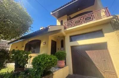 Casa em condomínio fechado com 3 quartos à venda na rua nações unidas, 493, nossa senhora das graças, canoas por r$ 750.000