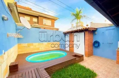 Casa em condomínio fechado com 4 quartos à venda na rua bélgica, 199, marechal rondon, canoas por r$ 979.000