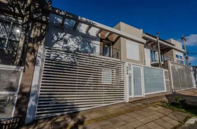 Casa em condomínio fechado com 3 quartos à venda na rua josé bonifácio, 608, nossa senhora das graças, canoas por r$ 692.000