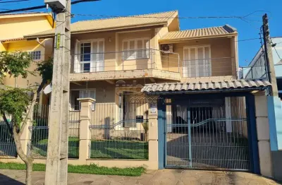 Casa em condomínio fechado com 4 quartos à venda na rua ramiro barcelos, 23, são josé, canoas por r$ 852.000