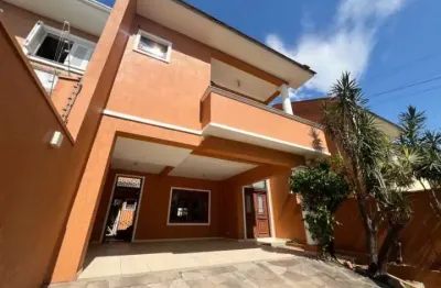 Casa em condomínio fechado com 3 quartos à venda na rua bélgica, 65, marechal rondon, canoas por r$ 1.299.900