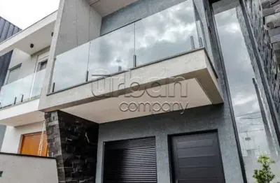 Casa em condomínio fechado com 3 quartos à venda na rua luis alberto ribeiro de castro, 141, estância velha, canoas por r$ 849.999