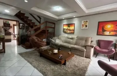 Casa em condomínio fechado com 3 quartos à venda na rua mário sérgio gabardo, 53, estância velha, canoas por r$ 1.396.000