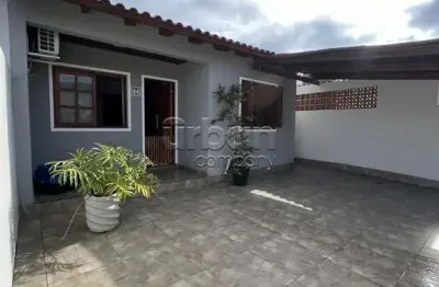 Casa em condomínio fechado com 3 quartos à venda na rua nebraska, 64, mato grande, canoas por r$ 409.999