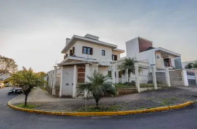 Casa em condomínio fechado com 4 quartos à venda na rua país de gales, 740, marechal rondon, canoas por r$ 1.299.000