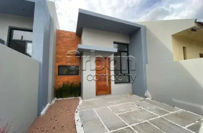 Casa em condomínio fechado com 3 quartos à venda na rua princesa isabel, 1185, fátima, canoas por r$ 430.000