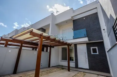 Casa em condomínio fechado com 3 quartos à venda na rua da figueira, 708, nossa senhora das graças, canoas por r$ 859.999