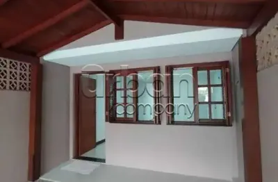 Casa em condomínio fechado com 2 quartos à venda na rua jardim américa, 66, harmonia, canoas por r$ 379.999
