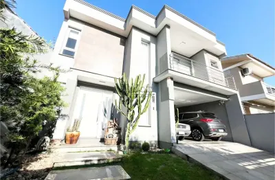 Casa em condomínio fechado com 3 quartos à venda na avenida doutor severo da silva, 1353, estância velha, canoas por r$ 2.199.000