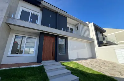 Casa em condomínio fechado com 4 quartos à venda na Rua Dinamarca, 262, Moinhos De Vento, Canoas por R$ 2.128.000