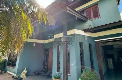 Casa em condomínio fechado com 4 quartos à venda na rua tenente antônio joão, 228, nossa senhora das graças, canoas por r$ 1.450.000