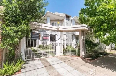 Casa em condomínio fechado com 4 quartos à venda na rua das bromélias, 259, estância velha, canoas por r$ 1.190.000