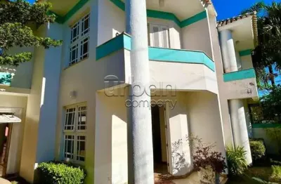 Casa em condomínio fechado com 4 quartos à venda na rua das bromélias, 259, estância velha, canoas por r$ 1.189.000
