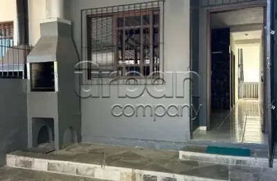 Casa em condomínio fechado com 3 quartos à venda na Rua Waldemar Silva de Souza, 85, São José, Canoas por R$ 320.000