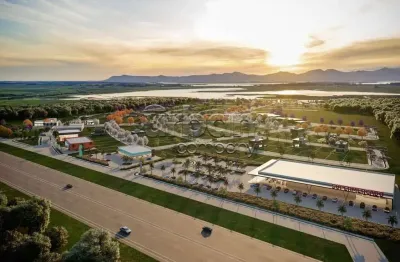 Terreno em condomínio fechado à venda na rs-389 - estrada do mar - km 19, 1, atlântida sul (distrito), osório por r$ 290.000