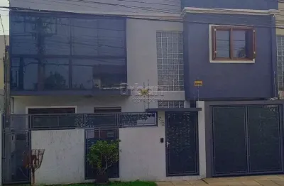 Casa em condomínio fechado com 3 quartos à venda na rua adão da silva santos, 772, são josé, canoas por r$ 550.000