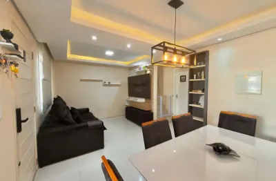 Casa em condomínio fechado com 3 quartos à venda na Rua dos Guaramirins, 303, Igara, Canoas por R$ 449.000