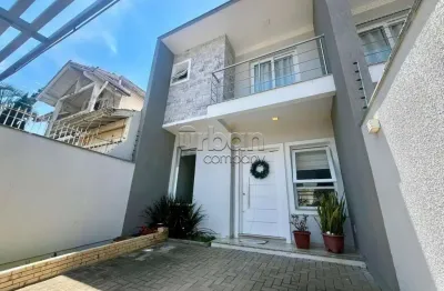 Casa em condomínio fechado com 3 quartos à venda na Rua dos Sabiás, 57, Igara, Canoas por R$ 849.000