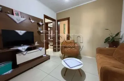 Casa em condomínio fechado com 3 quartos à venda na Rua Osvaldo Optiz, 722, Estância Velha, Canoas por R$ 680.000