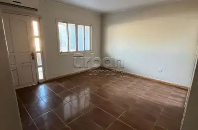 Casa em condomínio fechado com 2 quartos à venda na Rua Engenheiro Chang, 620, Fátima, Canoas por R$ 450.000