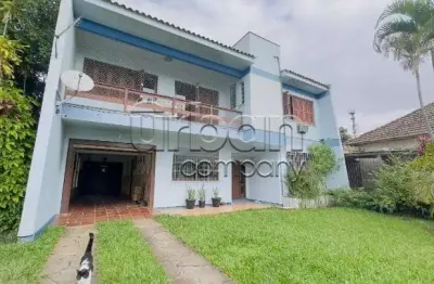 Casa em condomínio fechado com 5 quartos à venda na Rua Protásio Alves, 341, Niterói, Canoas por R$ 1.050.000