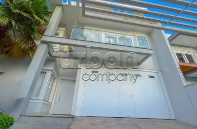 Casa em condomínio fechado com 3 quartos à venda na Rua Henrique Kranen Filho, 85, Estância Velha, Canoas por R$ 1.990.000