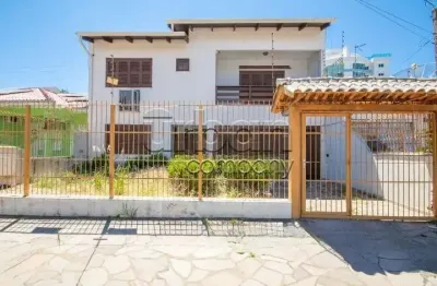 Casa em condomínio fechado com 4 quartos à venda na Rua Santini Longoni, 293, Marechal Rondon, Canoas por R$ 990.000