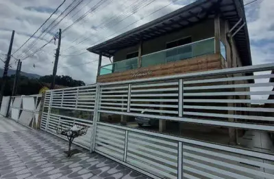 Locação imperdível! casa de condomínio com sacada, princesa, praia grande, sp