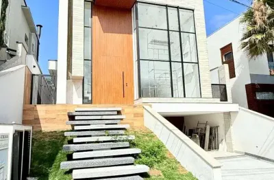Casa com 4 dormitórios à venda, 293 m² por r$ 3.700.000,00 - condomínio real park - arujá/sp
