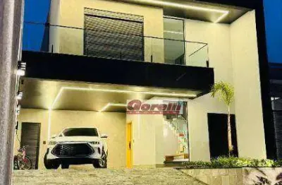 Casa com 3 dormitórios à venda, 340 m² por r$ 4.700.000,00 - condomínio real park - arujá/sp