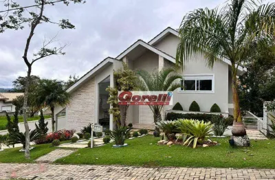 Casa com 5 dormitórios, 514 m² - venda por r$ 2.800.000,00 ou aluguel por r$ 18.000,01/mês - condomínio reserva ibirapitanga - santa isabel/sp
