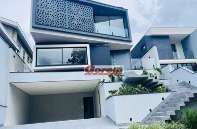 Casa com 4 dormitórios à venda, 330 m² por r$ 3.890.000,00 - condomínio real park - arujá/sp